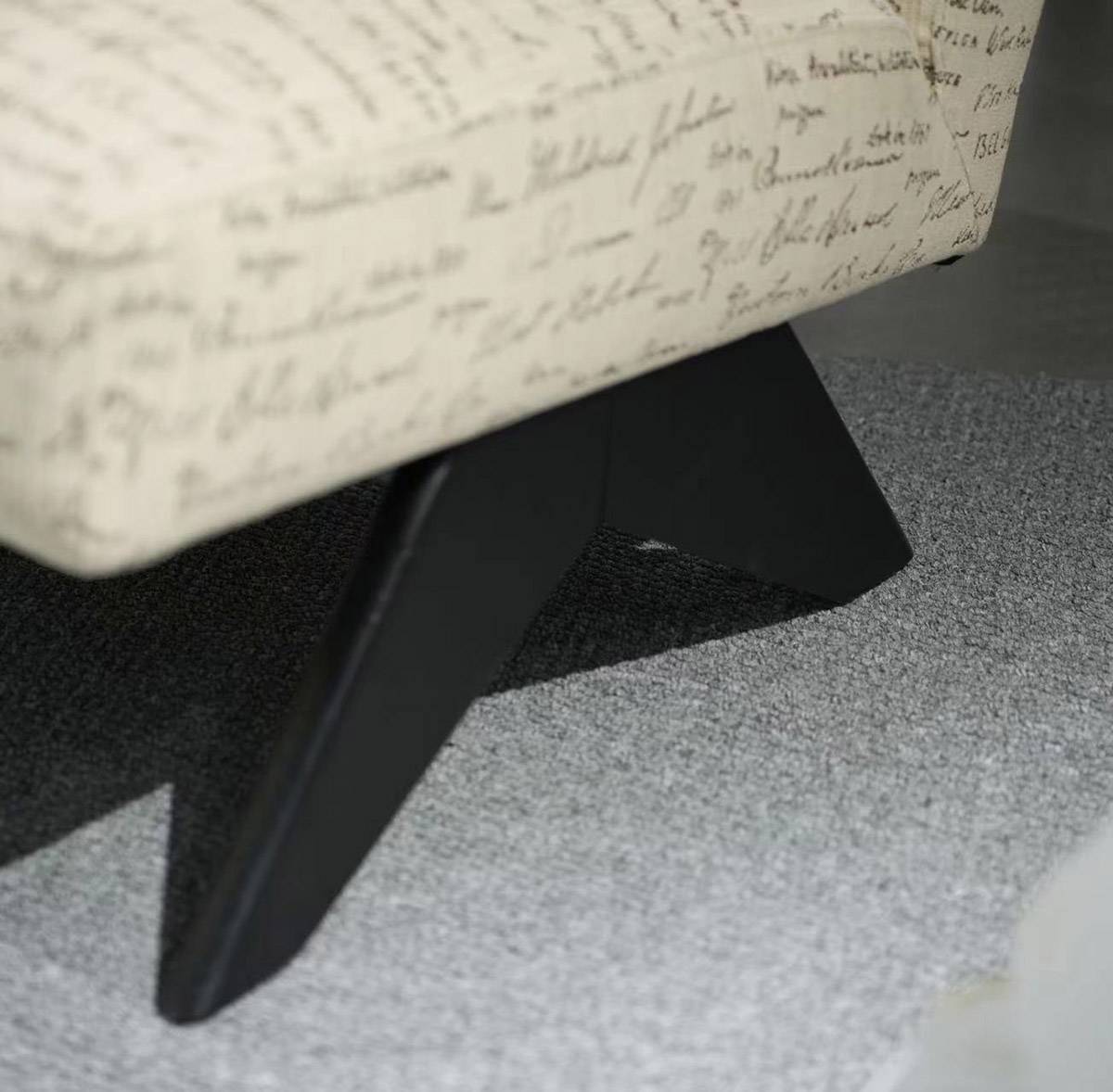Close-up of the black Ash wood base frame and legs of the chair