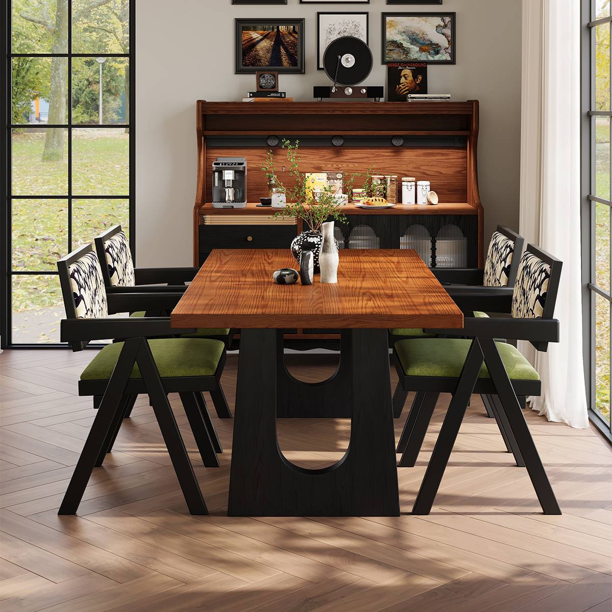 Front view of the dining table with black frame chairs and green cushions