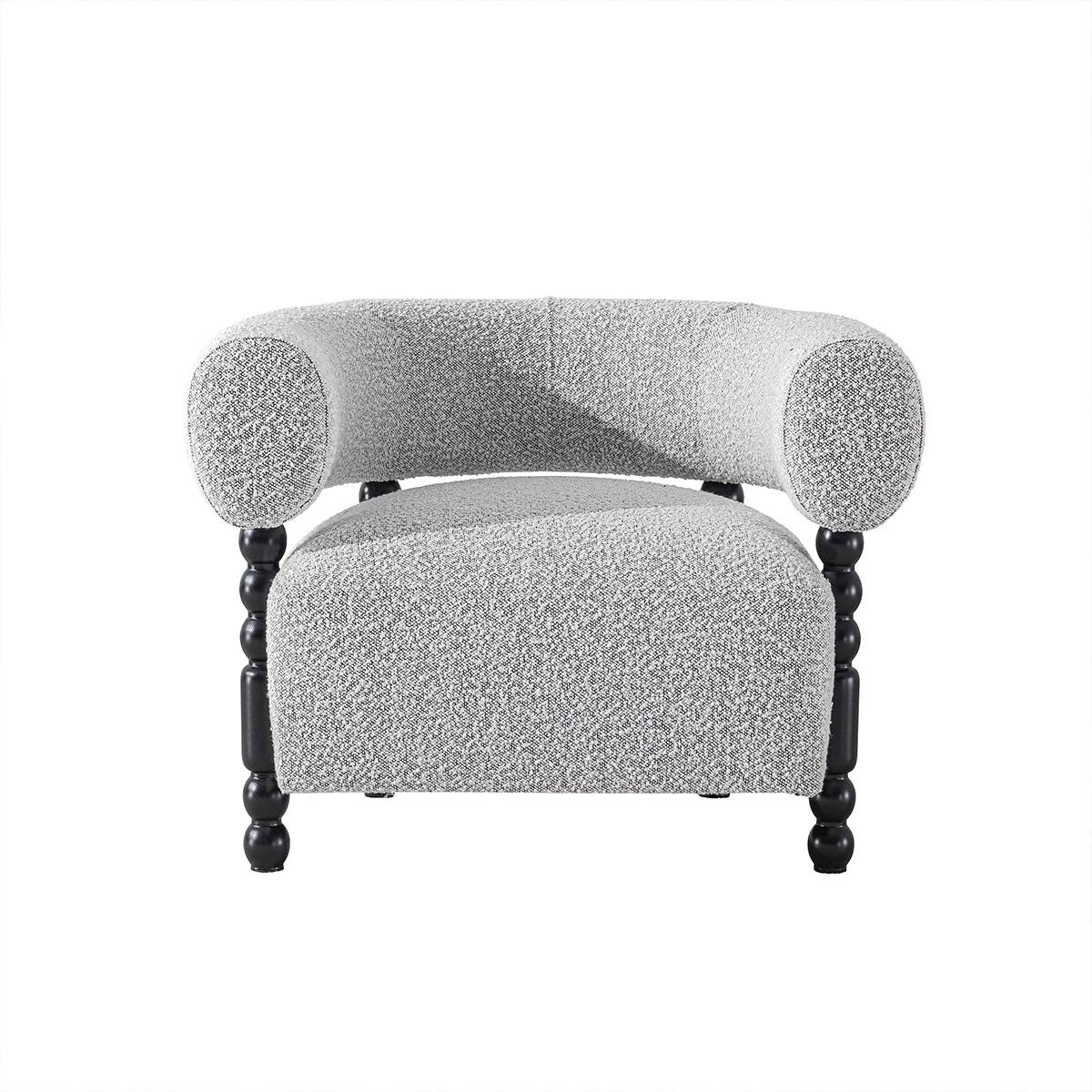Front view of the grey lounge chair showing the curved backrest and seat