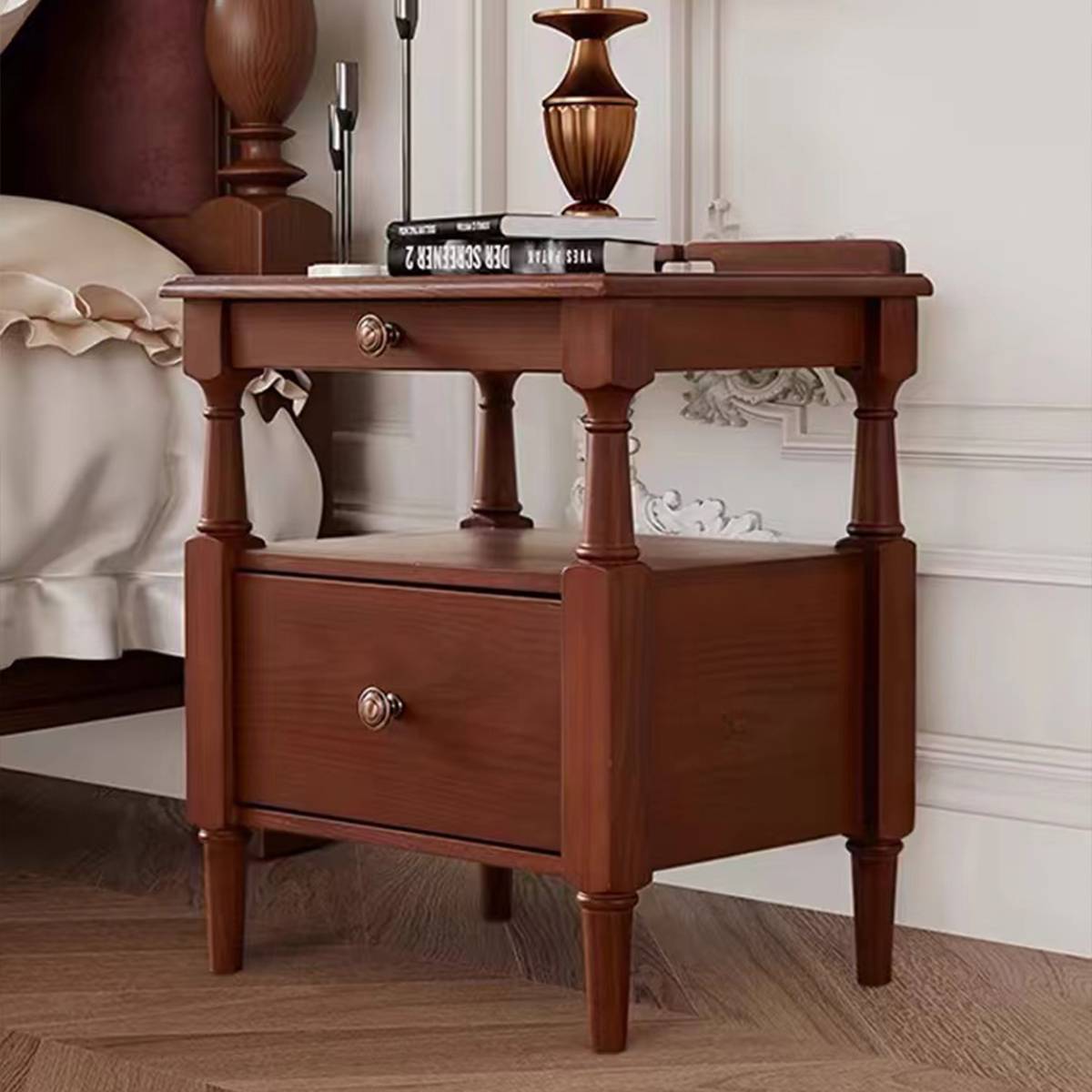 Mid-century red oak bedside table in a bedroom setting
