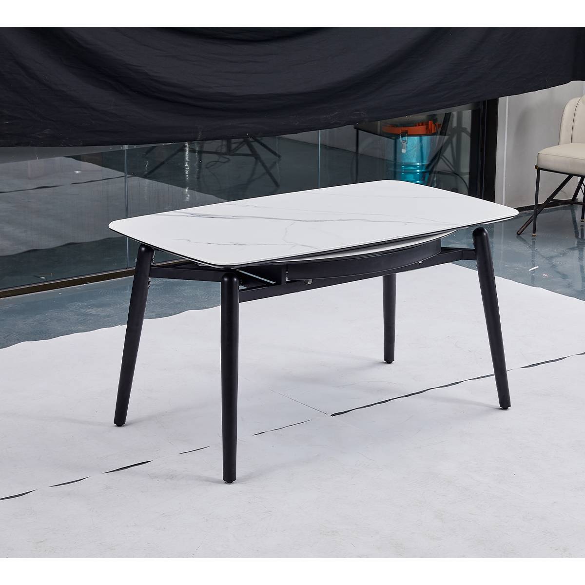 Side view of the dining table showing the extension mechanism