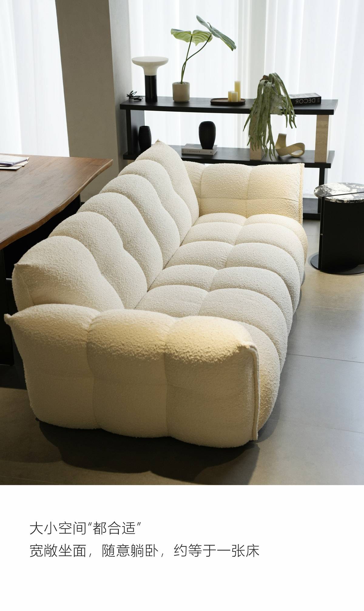 Side view of the sofa showing the deep seat and tufted backrest