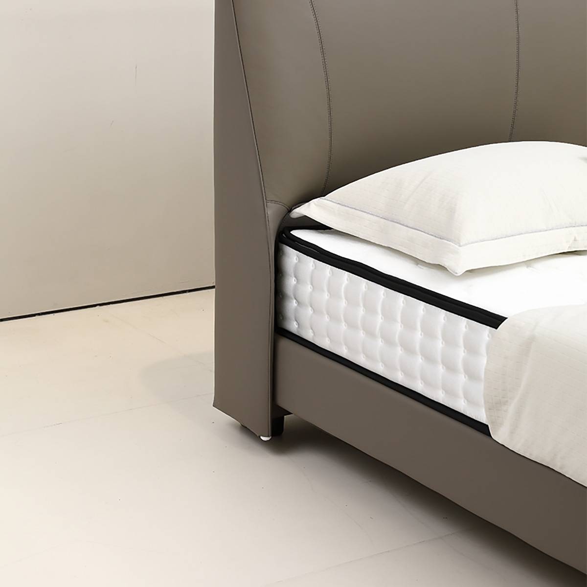 Close-up detail of the headboard side and mattress edge