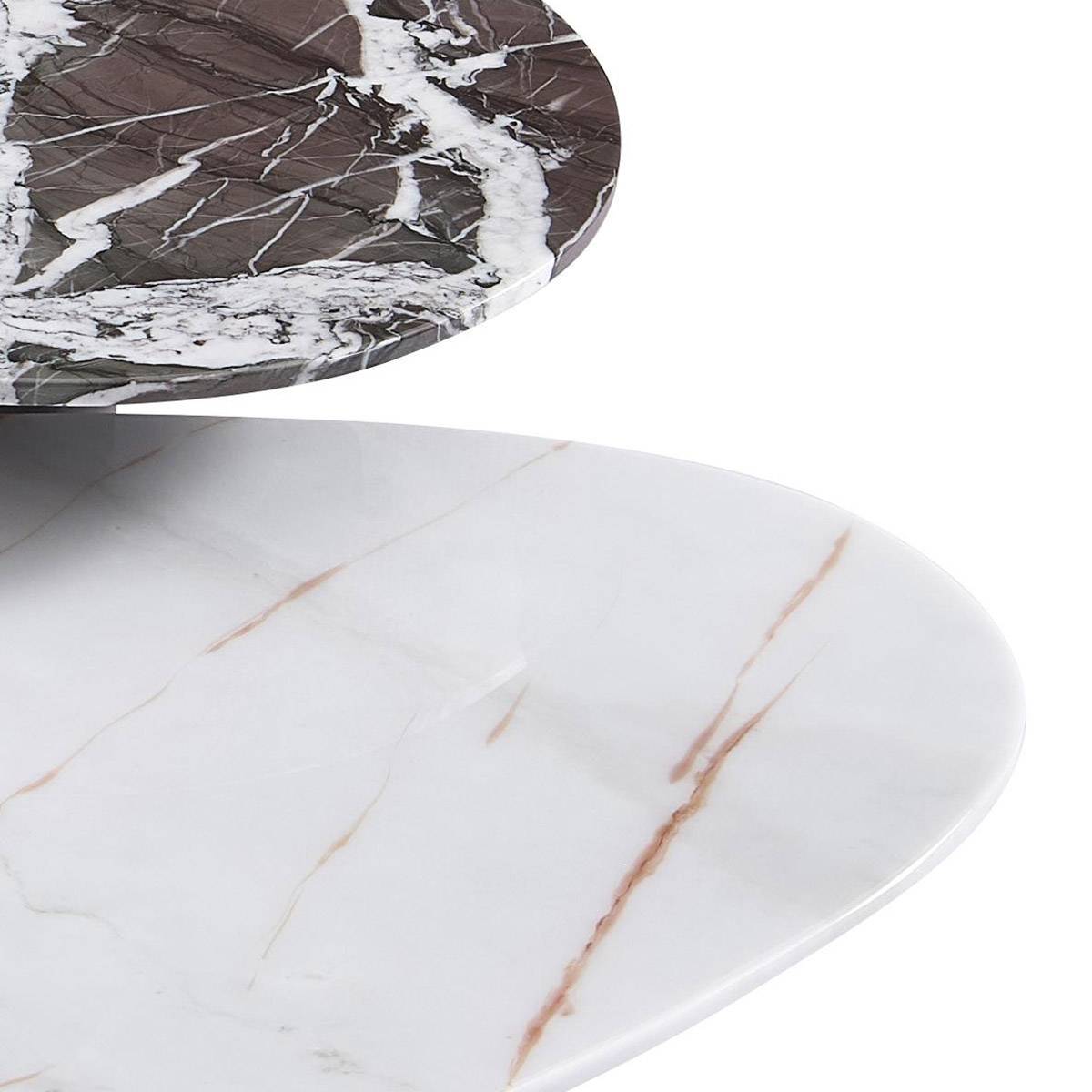 Close-up detail of the contrasting marble textures on the table tops
