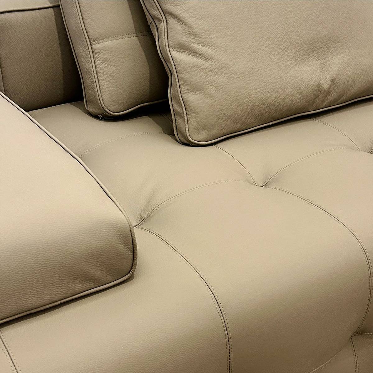Close-up of the sofa corner and cushion arrangement