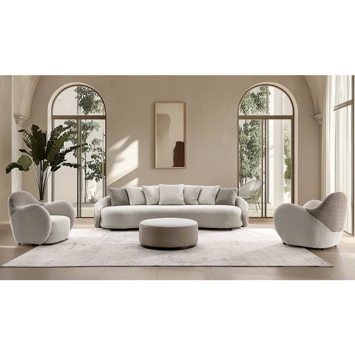 Lifestyle shot of the sofa in a modern living room setting with matching chairs and ottoman