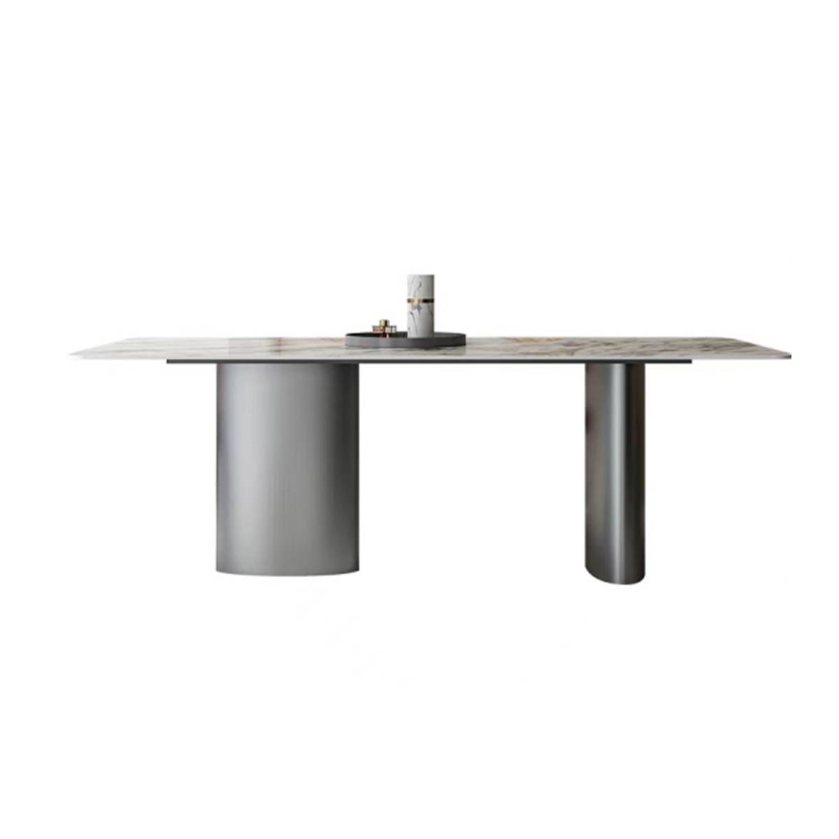 Front view of dining table with sintered stone top and brushed stainless steel base against white background