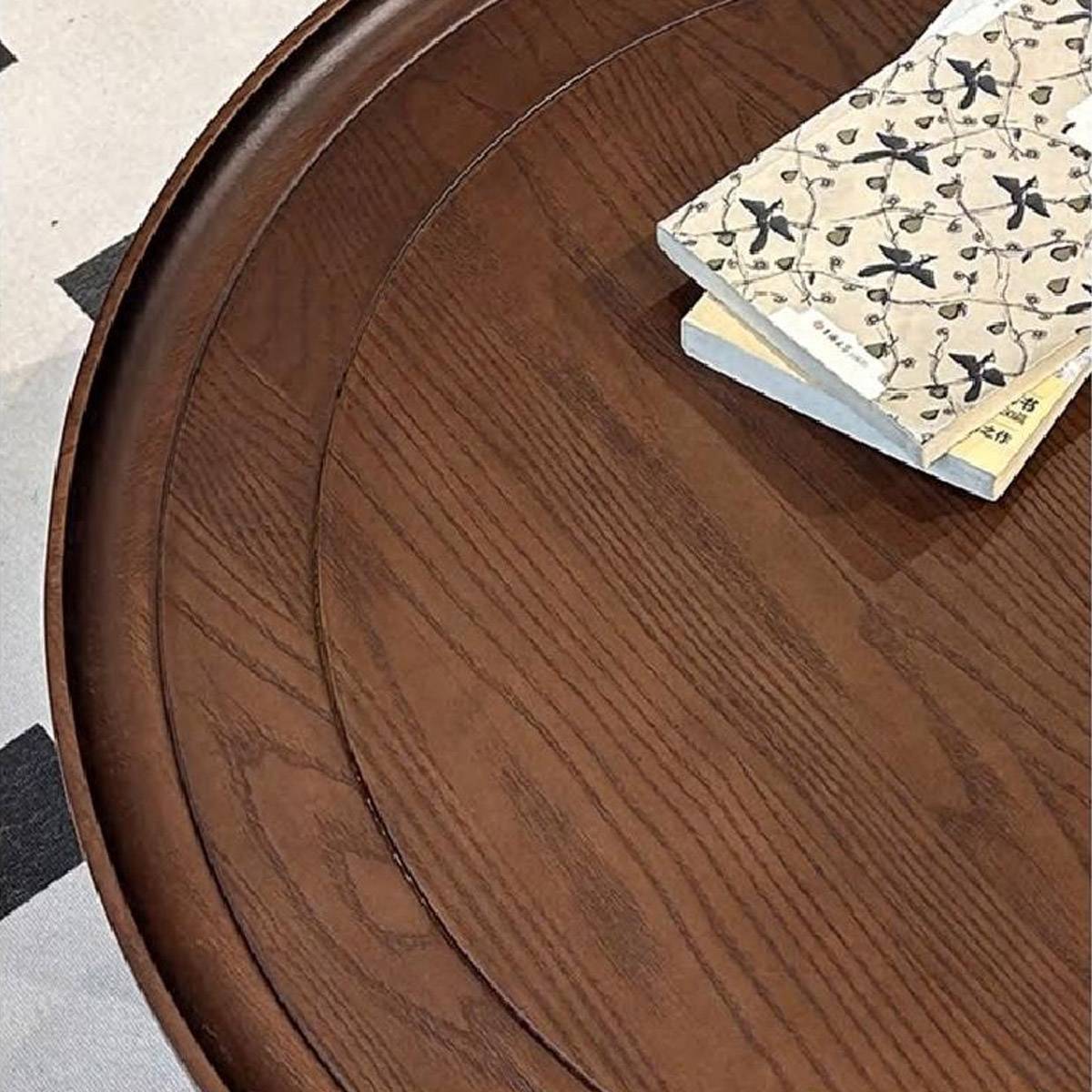 Close-up detail of the wood grain texture on the table surface.