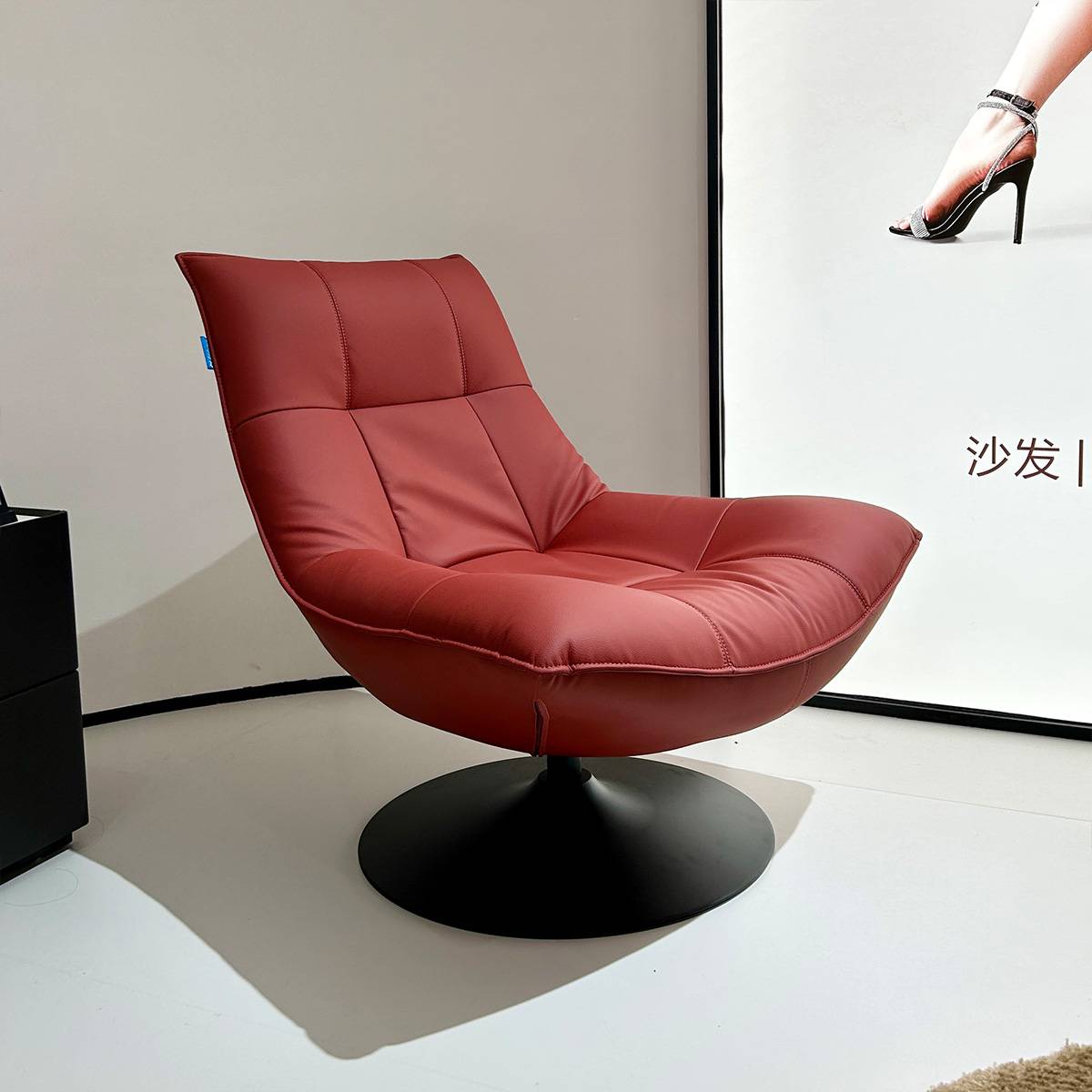 Side view of the red lounge chair