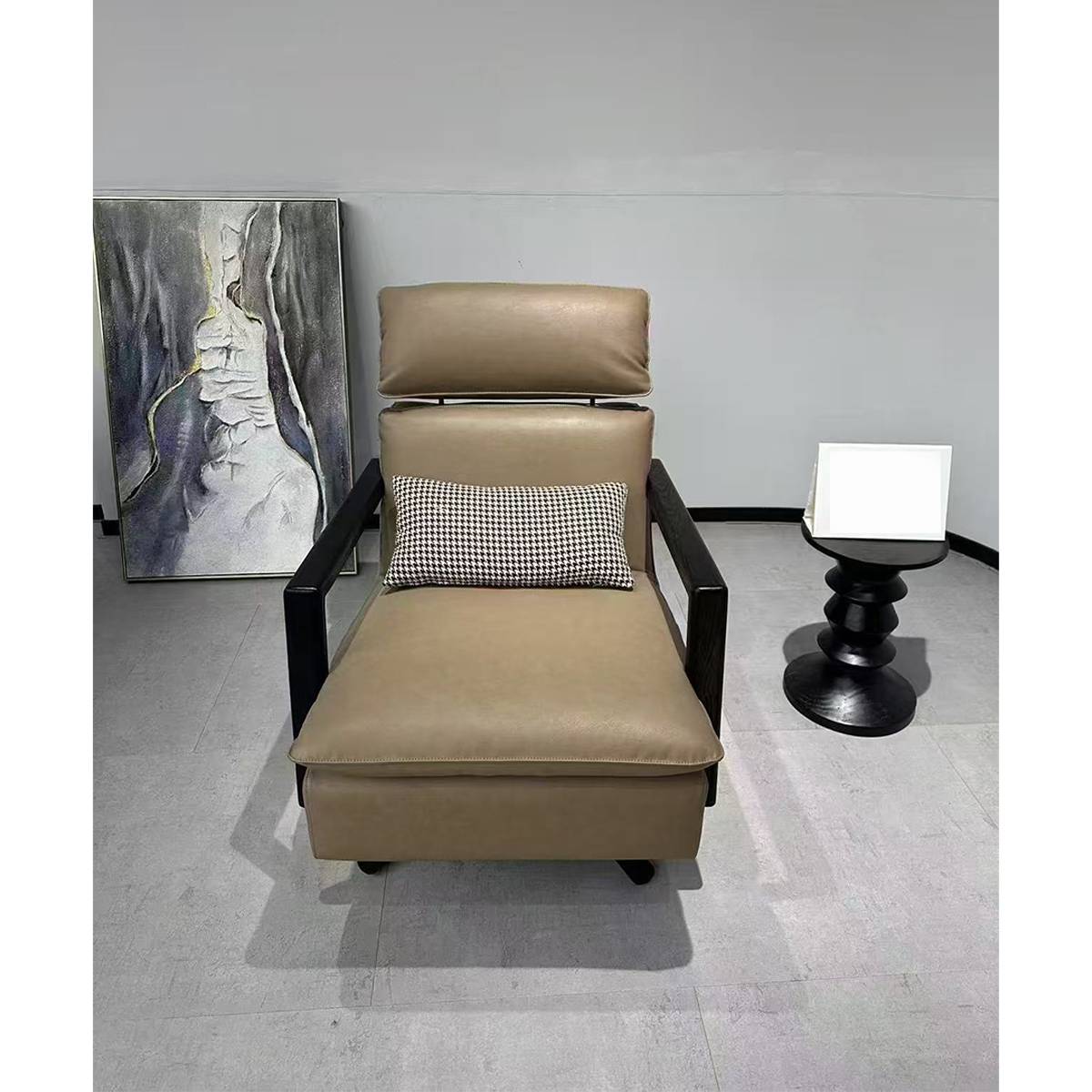 Front view of beige lounge chair with checkered cushion and headrest