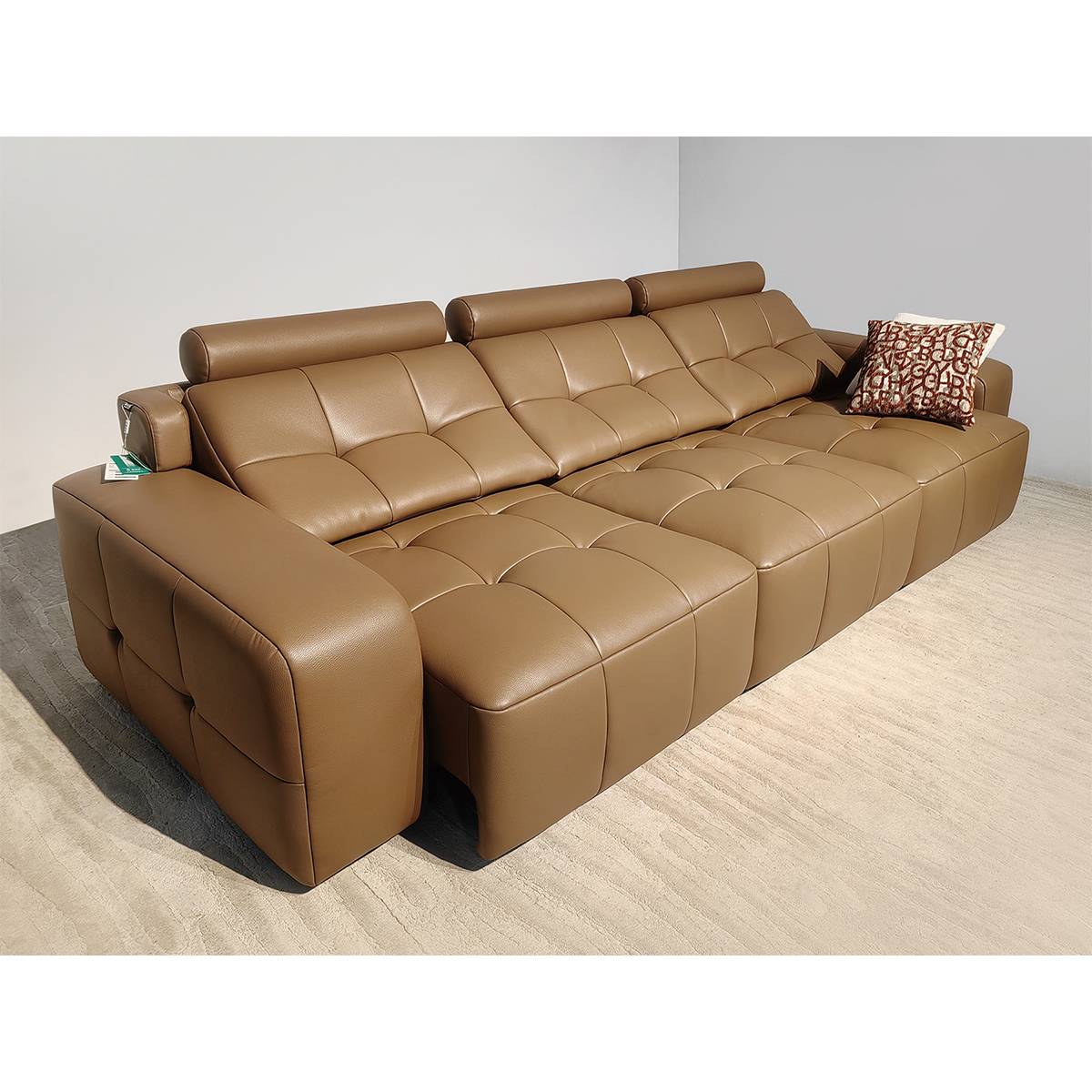 Brown eco-leather electric sofa bed showing tufted cushion details