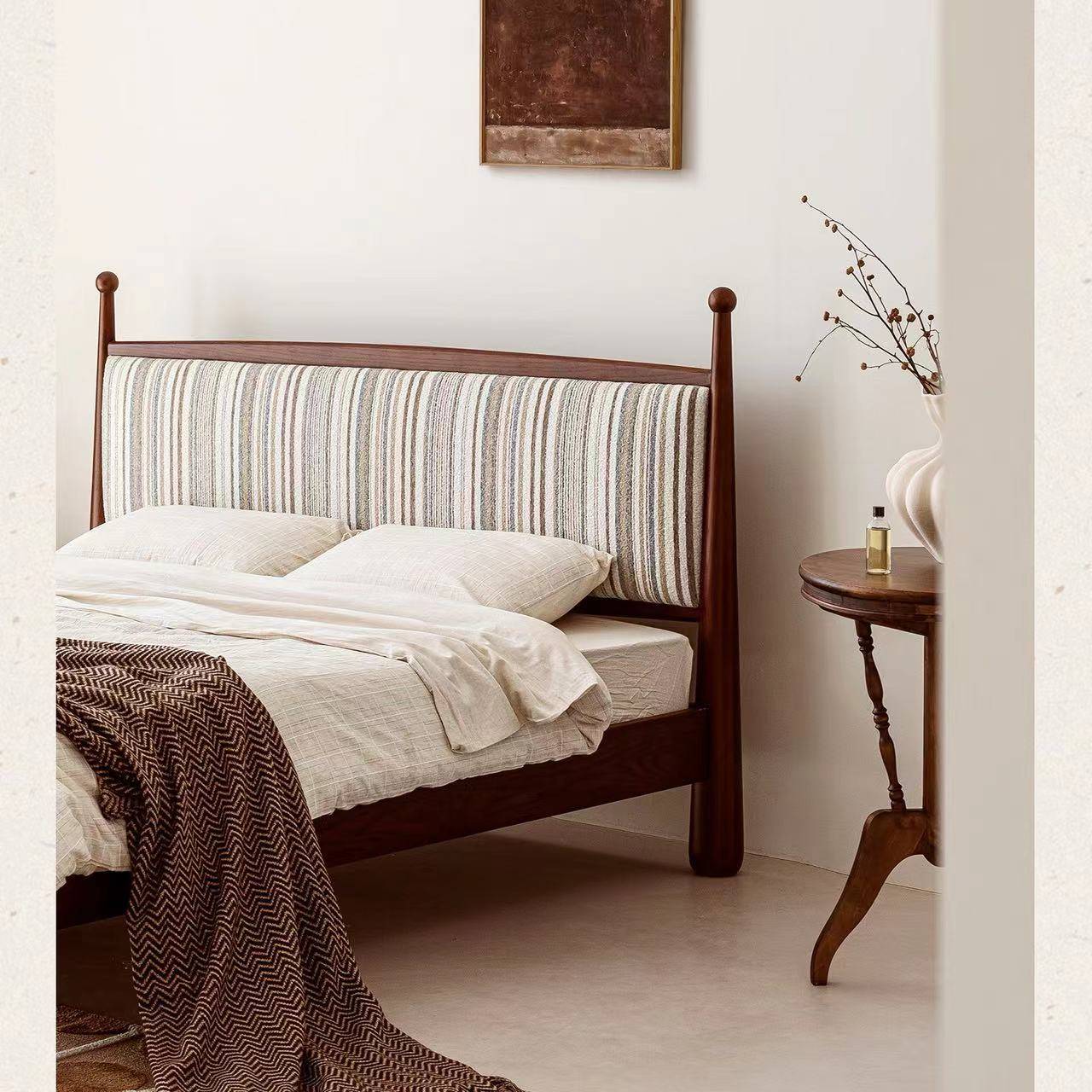 Angle view of the bed showing the wooden frame details