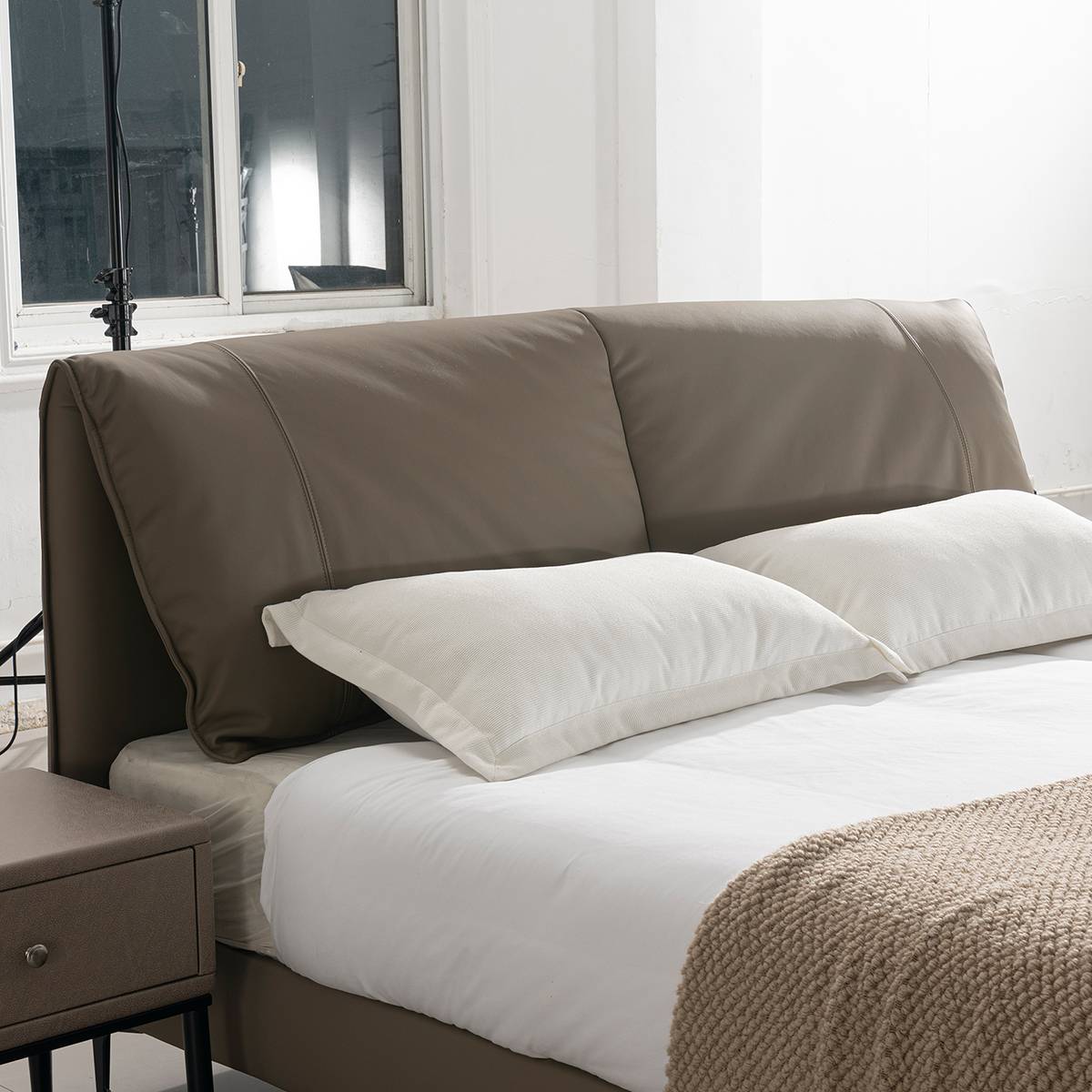 Close-up of the bed headboard and pillows