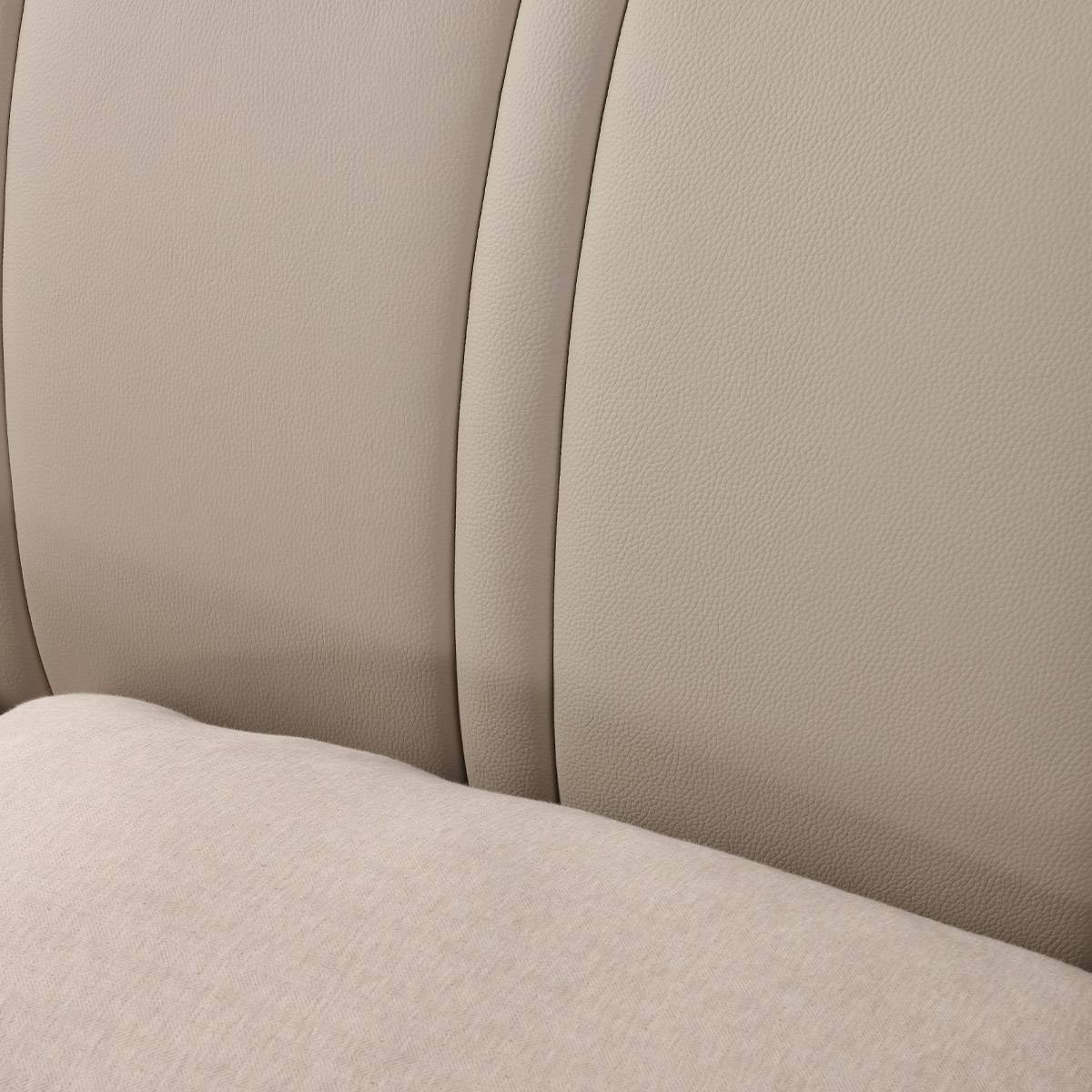 Detail shot of the textured leather headboard