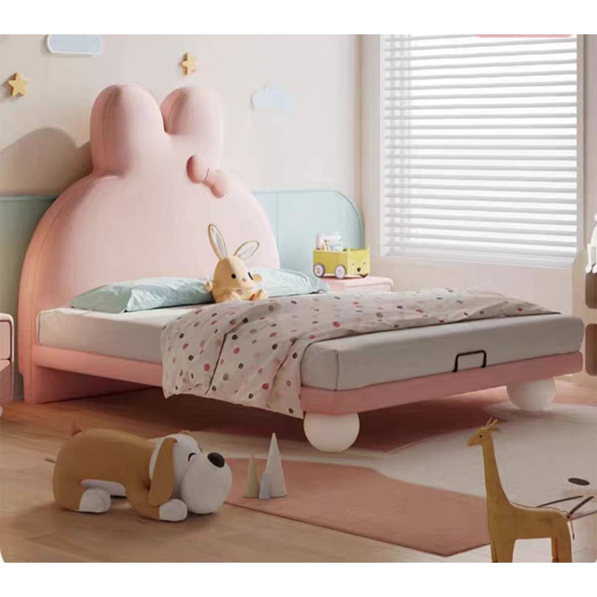 Pink rabbit headboard children's bed in a bedroom setting