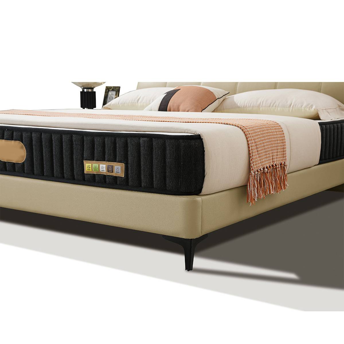 Bedroom setting showing the bed with lighting and decor