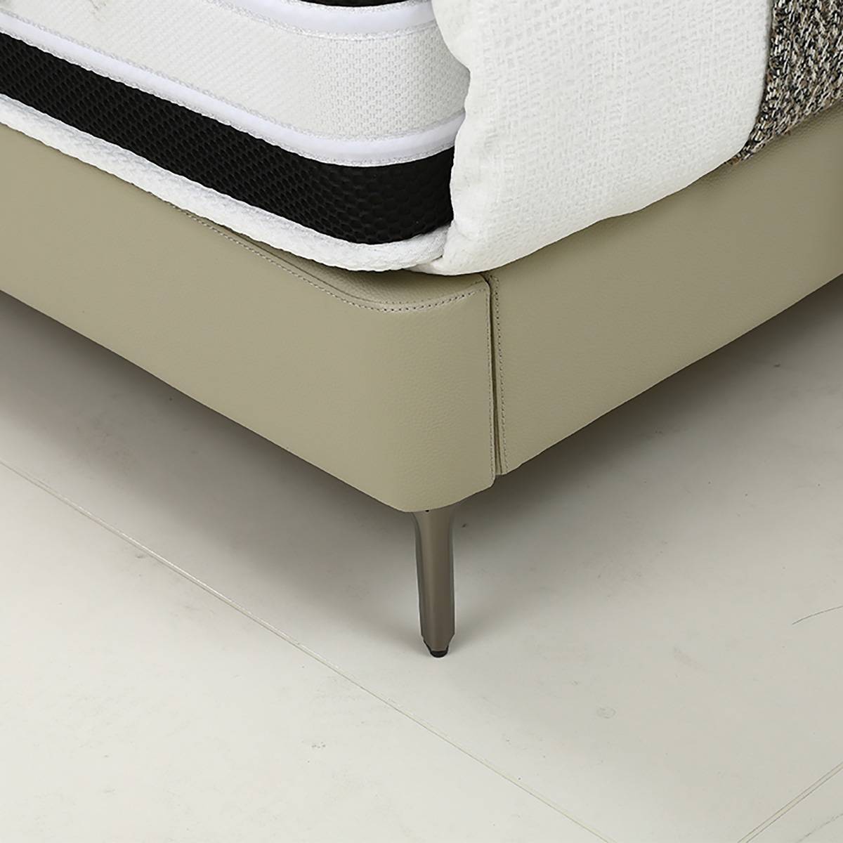 Detail shot of the bed frame corner and metal leg