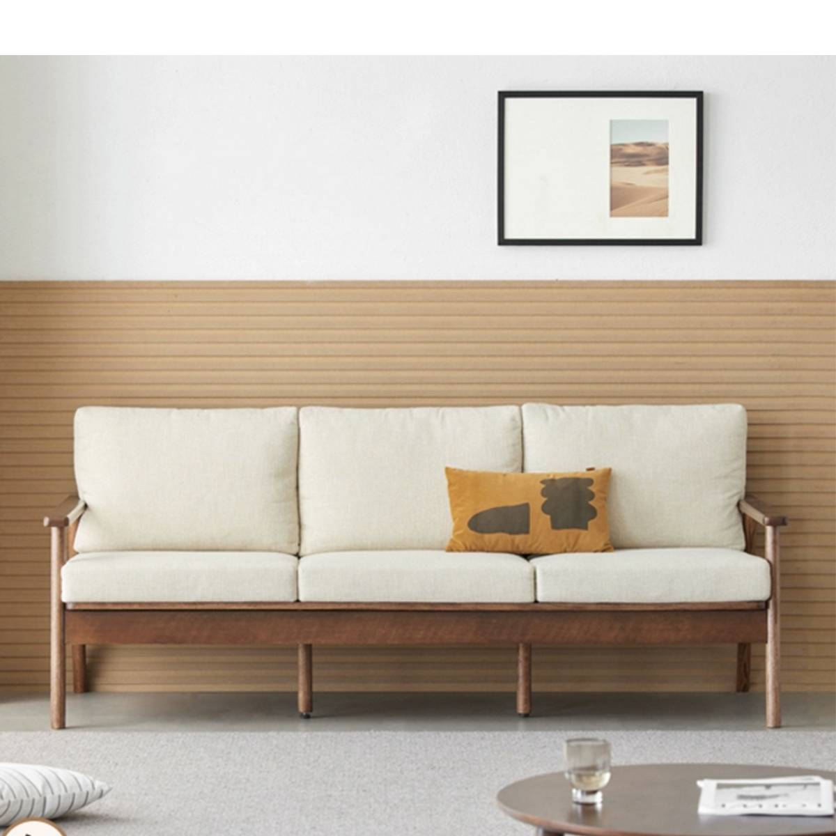 Front view of the Seattle B sofa in natural wood finish with cream cushions