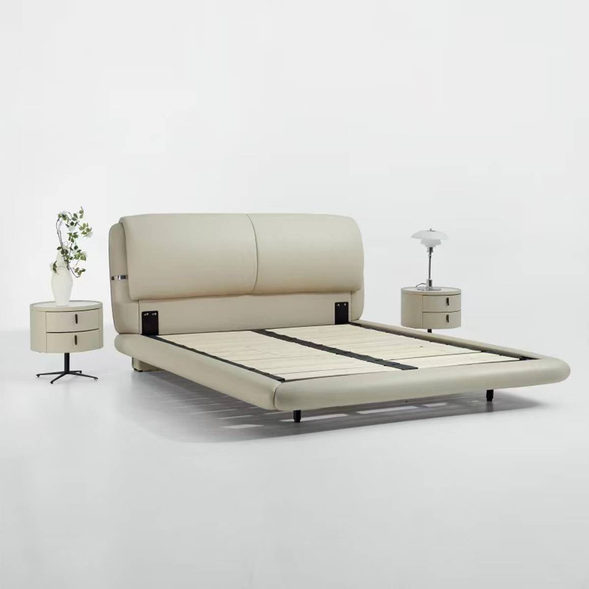 Bed frame without mattress showing the wooden slat base and metal brackets