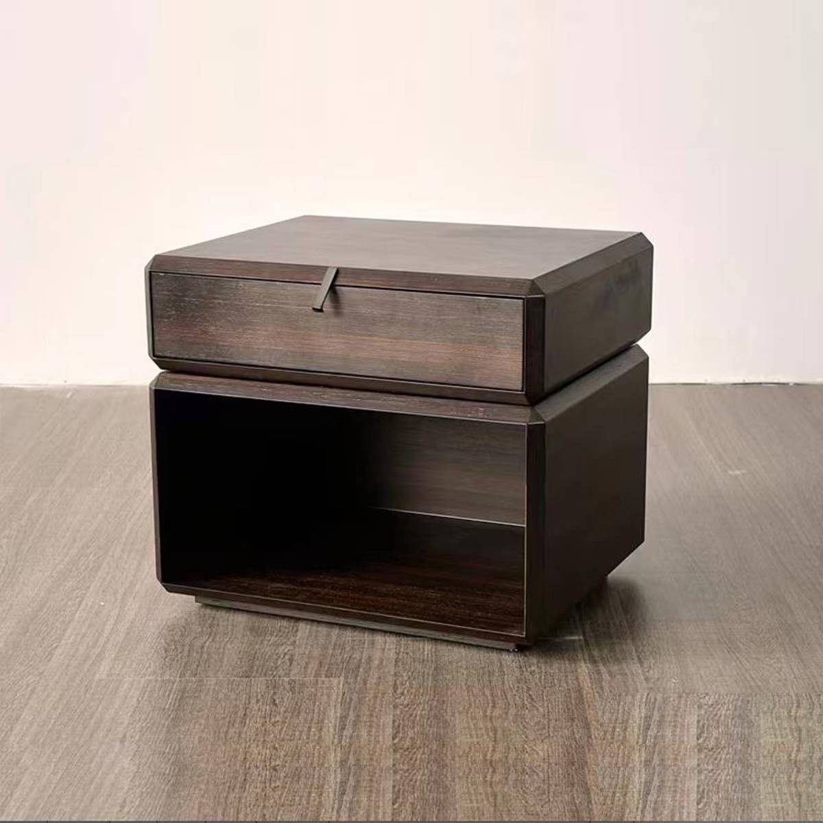 Angled view of the bedside cabinet showing the smoked wood veneer texture and geometric shape.