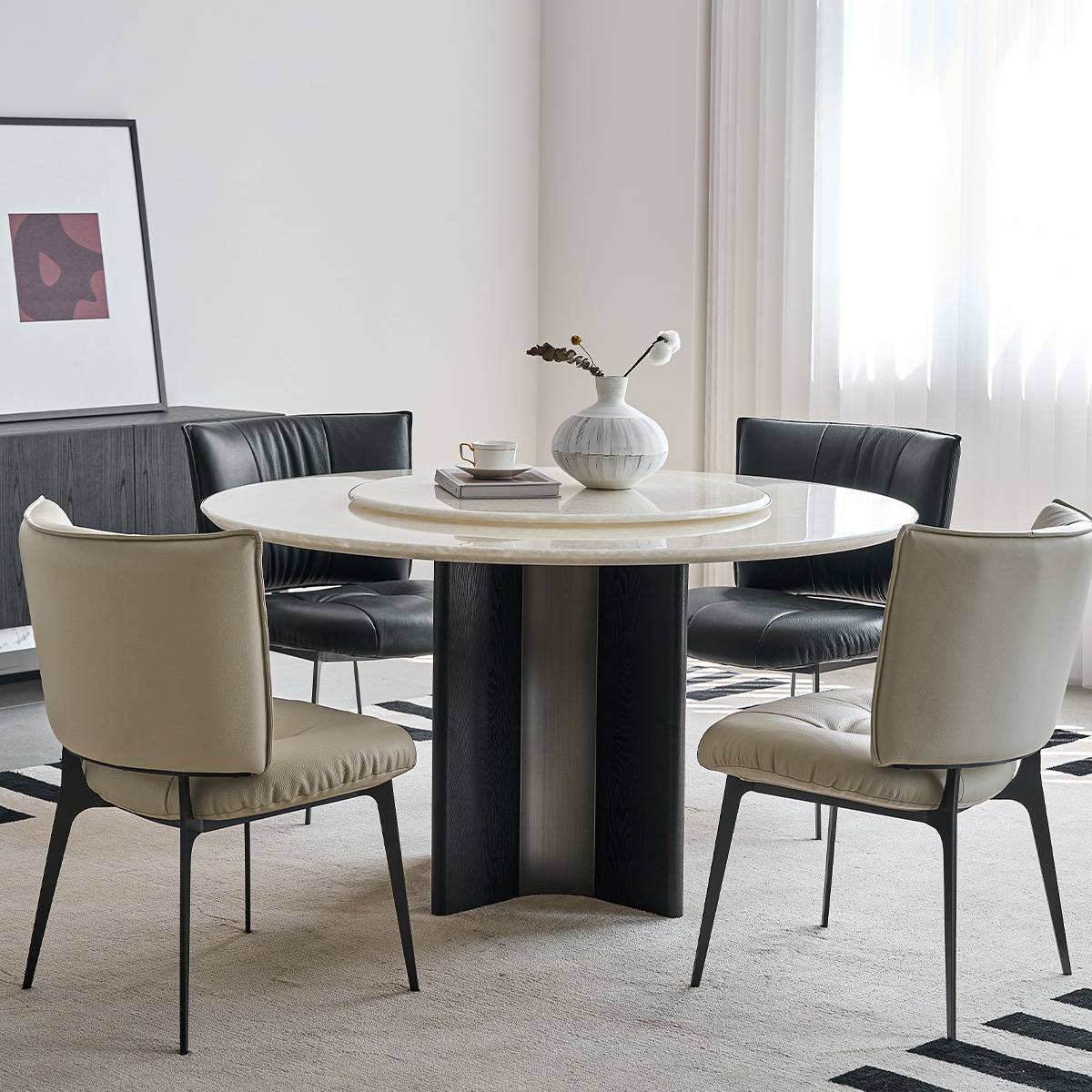 Angled view of the dining table set in a dining room environment with natural lighting.