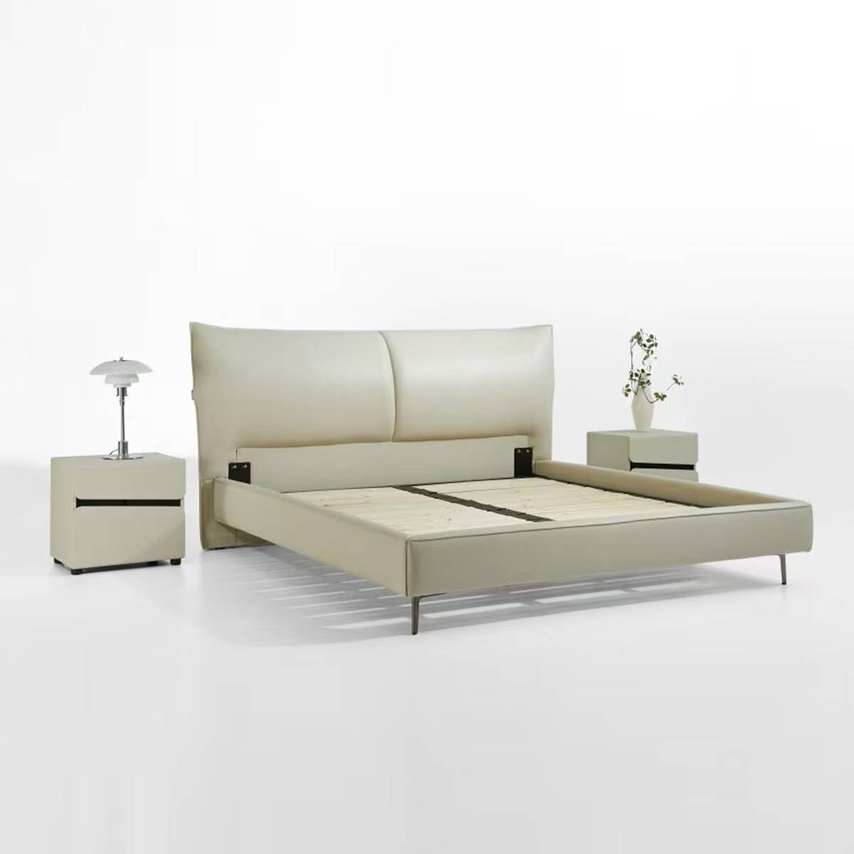 Bed frame without mattress showing the wooden slat base and internal structure