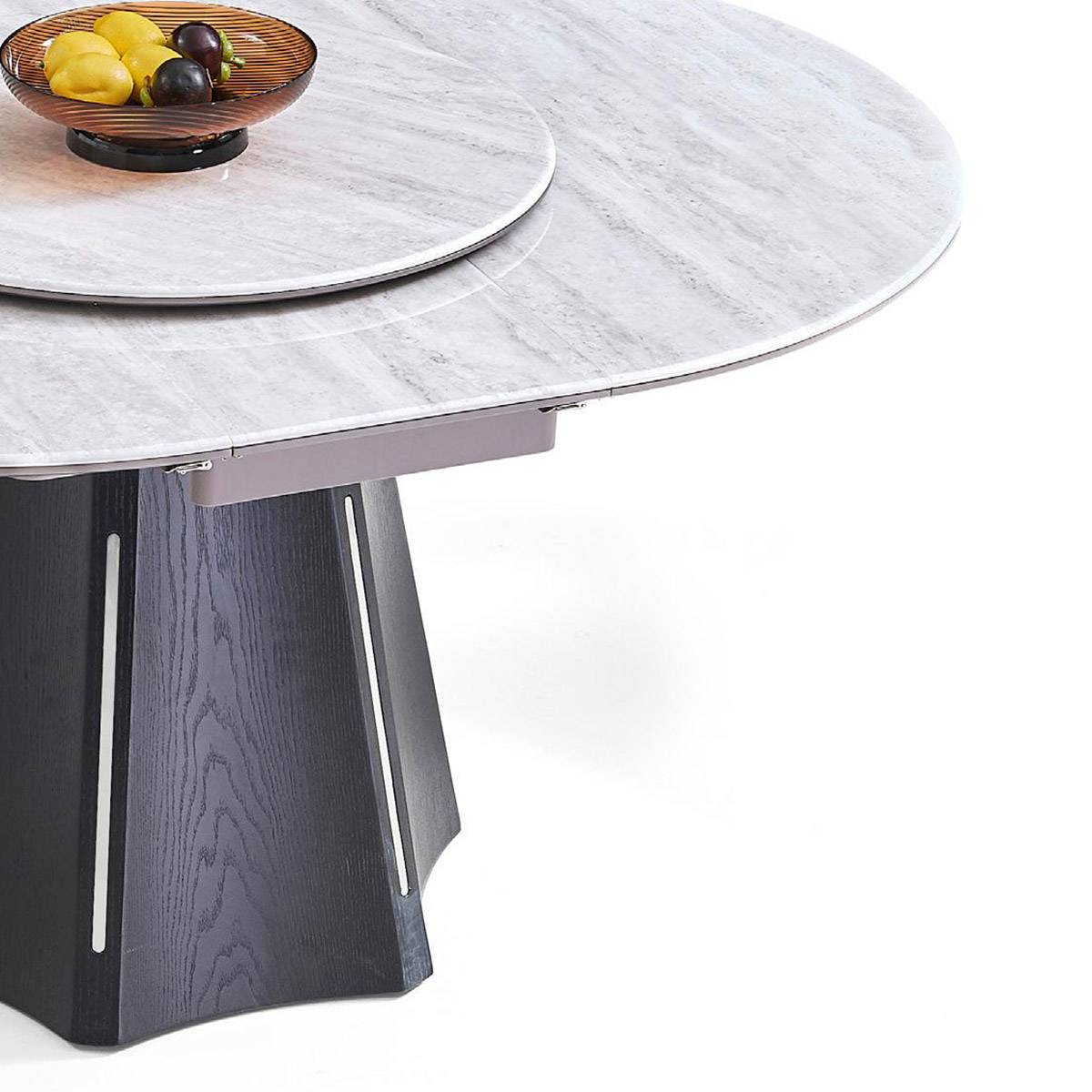 Close-up detail of the table edge showing the expansion mechanism and base texture