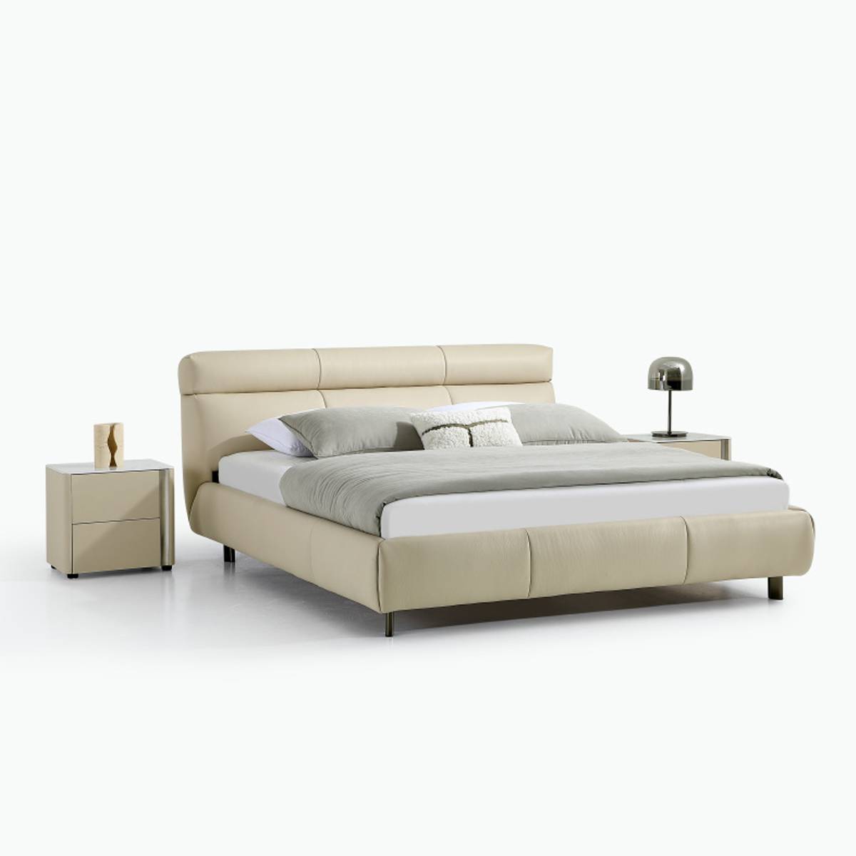 Side angle view of the beige leather soft bed