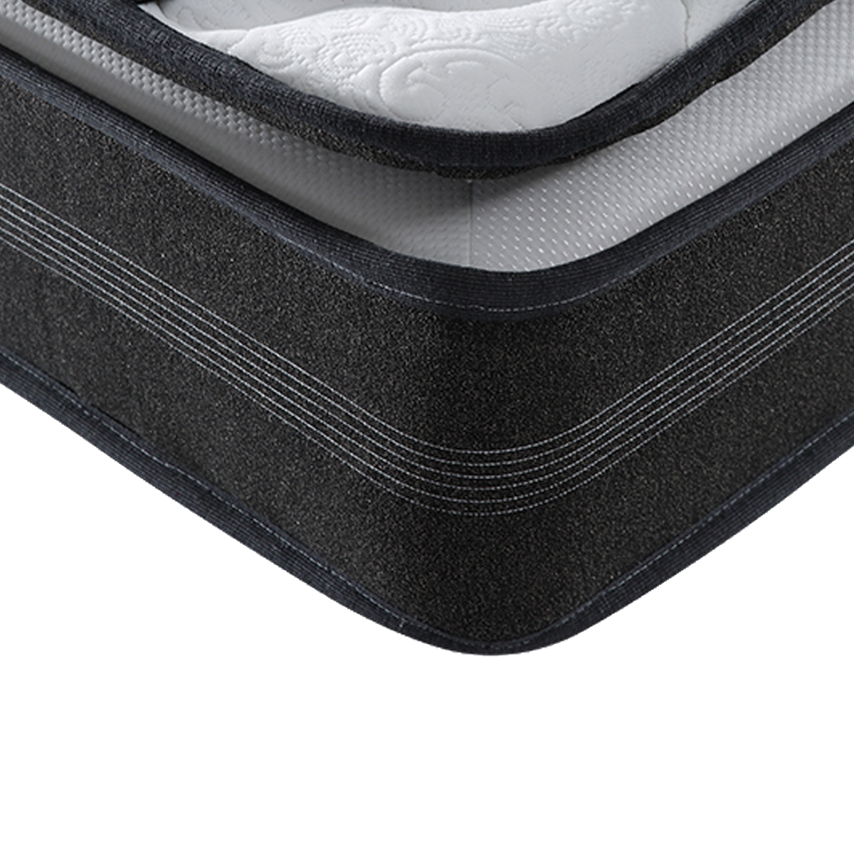 Close-up detail of the mattress corner showing the fabric texture and stitching