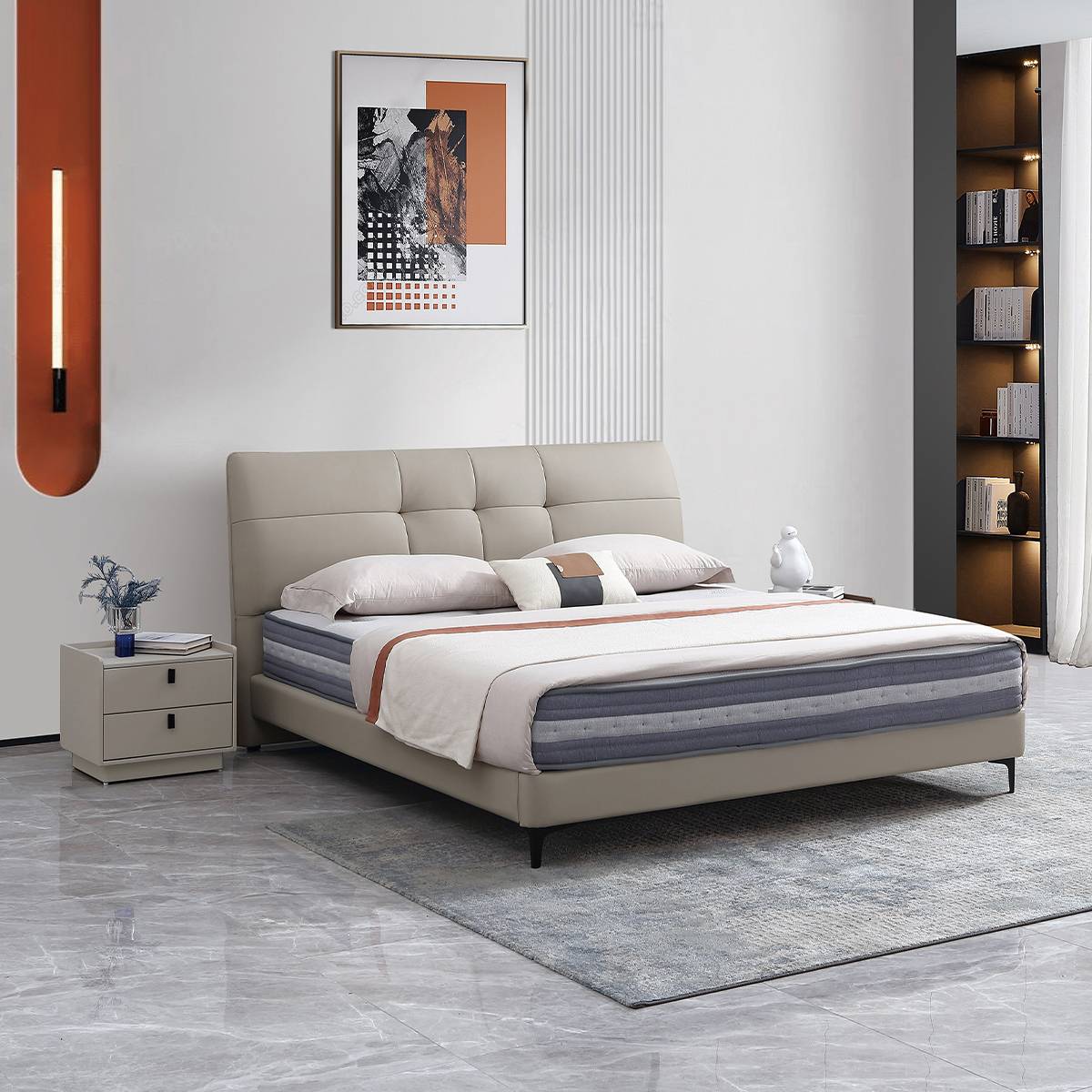 Side view of beige leather soft bed in a modern bedroom setting