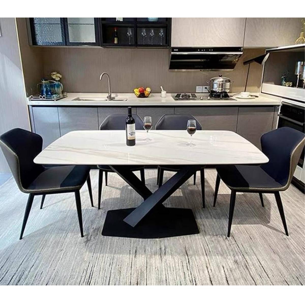 Front view of the Z60 Dining Table showing the X-shaped base and white stone top