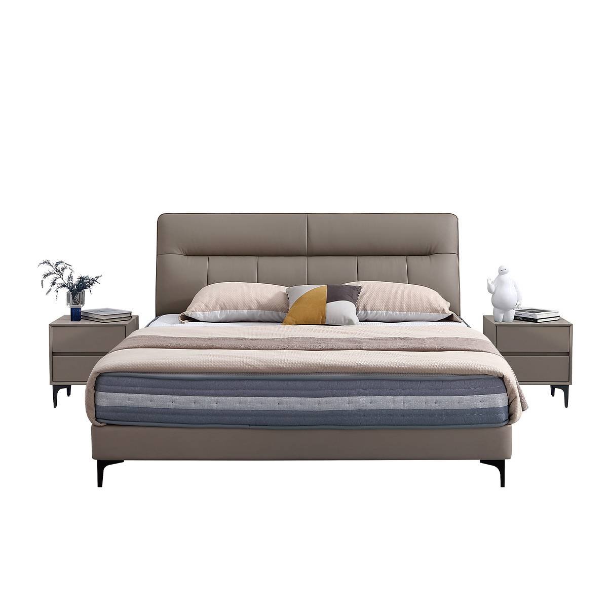 Front view of a beige modern leather bed with a padded headboard and matching bedside tables