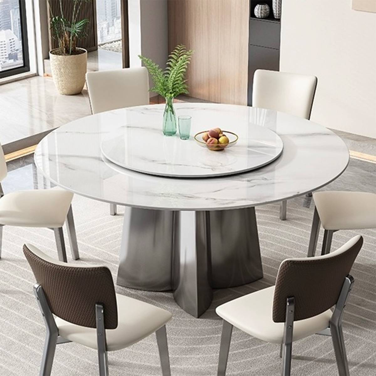 Side view of the round dining table showing the rotating tray and chairs