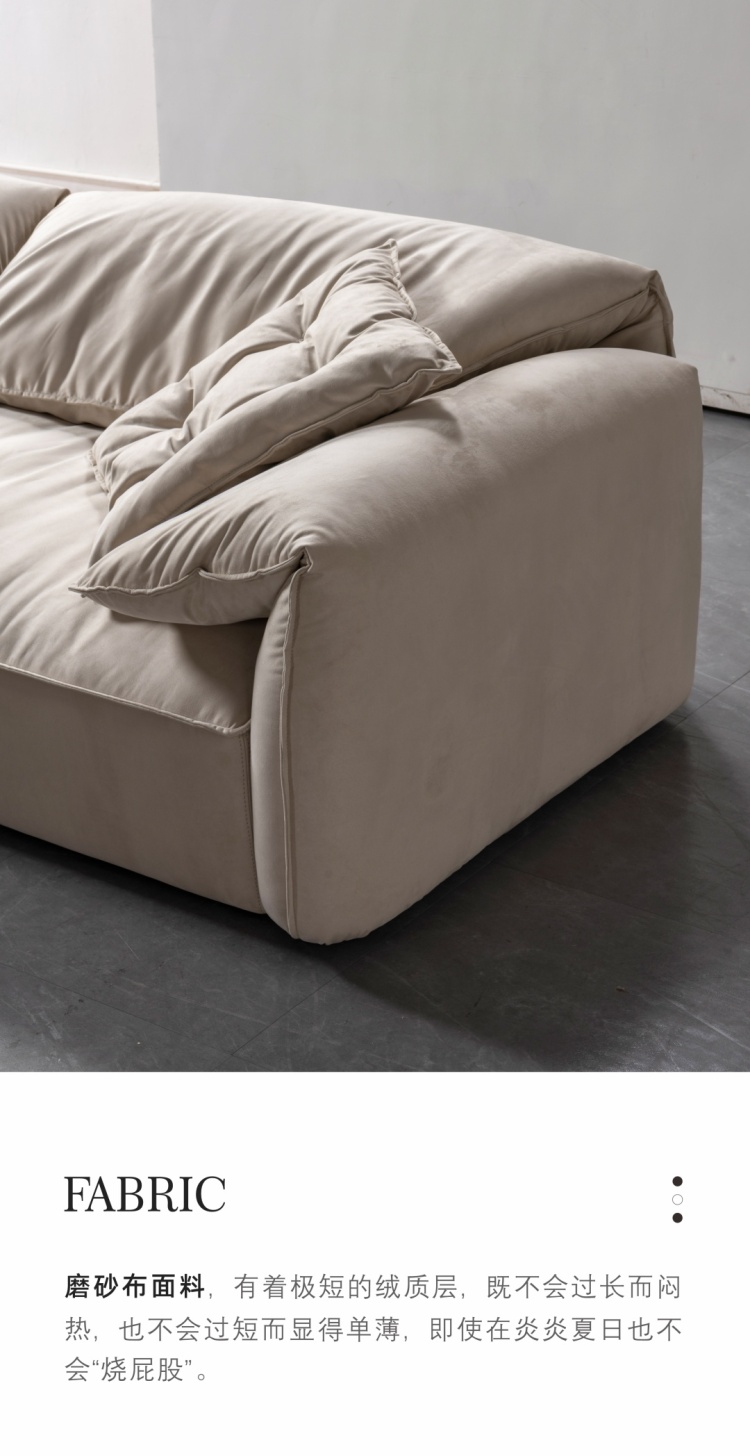 Close-up of the sofa armrest and seat cushion showing the fabric quality.