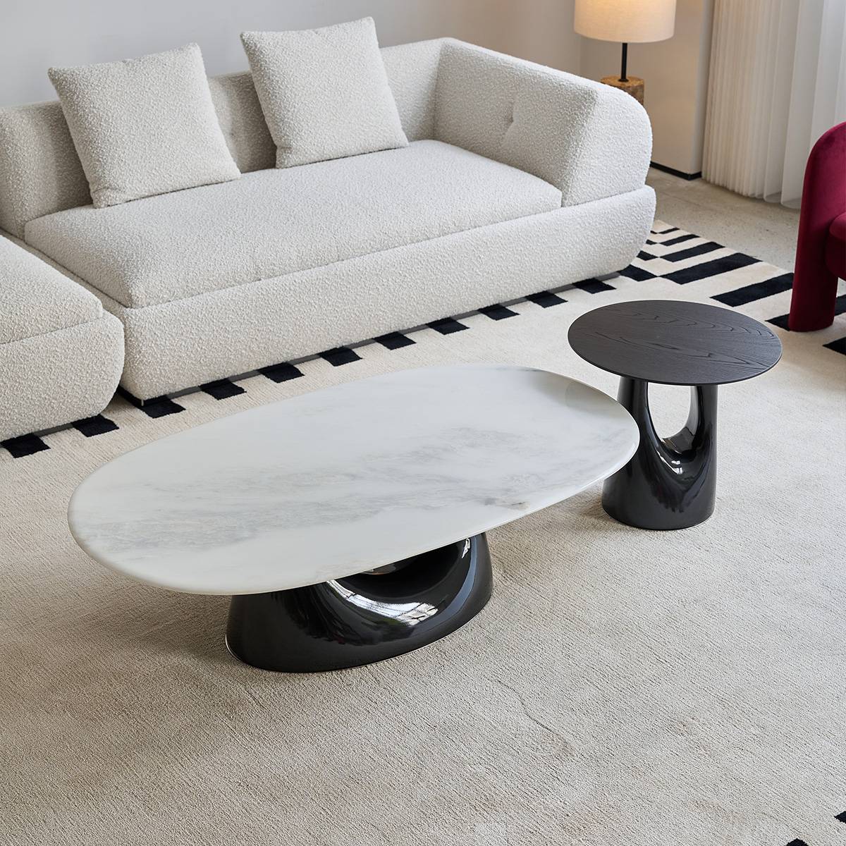 Side angle view of the coffee table highlighting the curved base