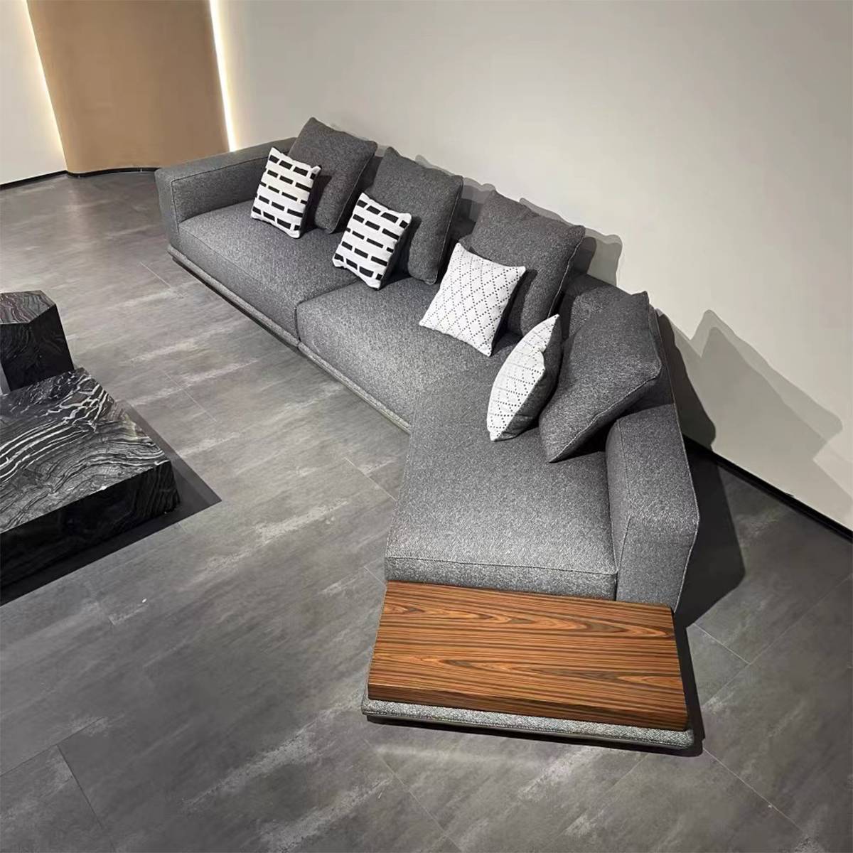 High-angle view of the sofa highlighting the L-shape and the texture of the fabric.