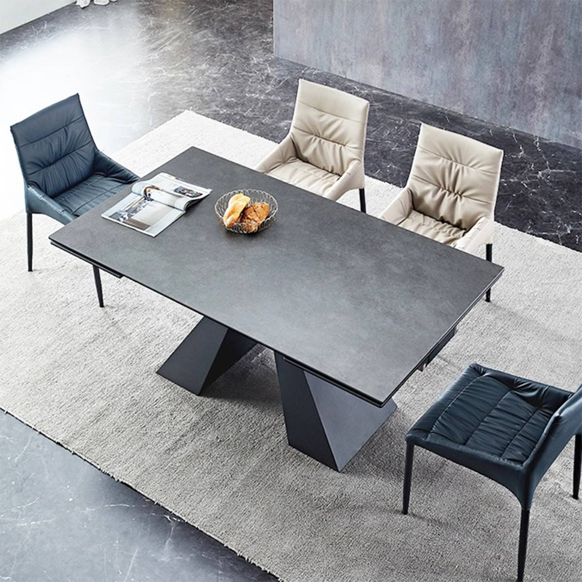 High angle view of the dark grey dining table with geometric base