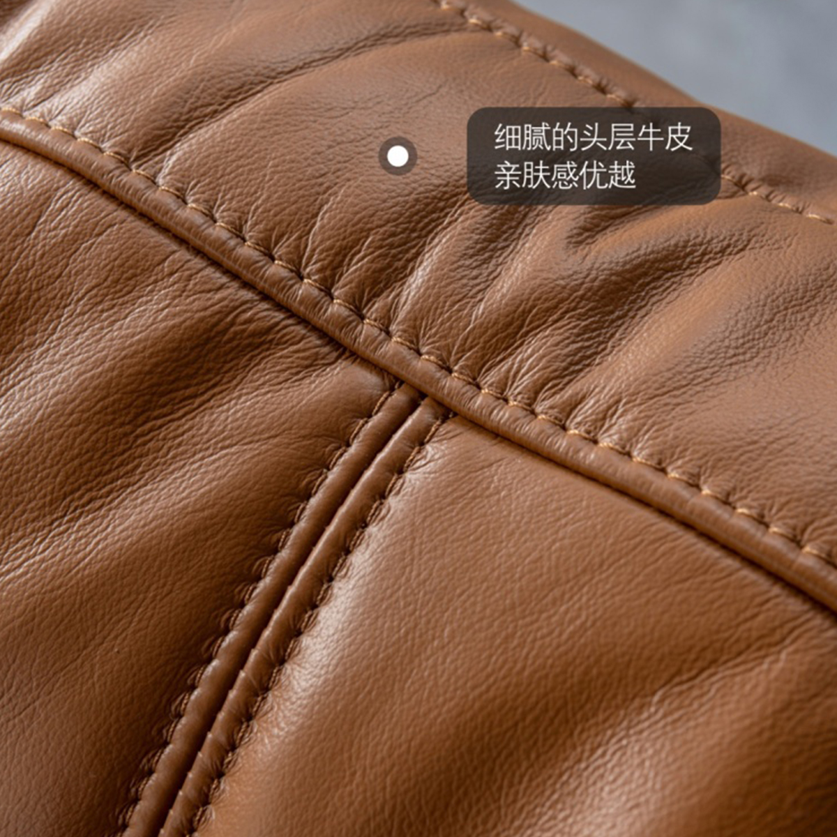 Full view of the brown leather soft bed with white bedding in a modern bedroom setting.