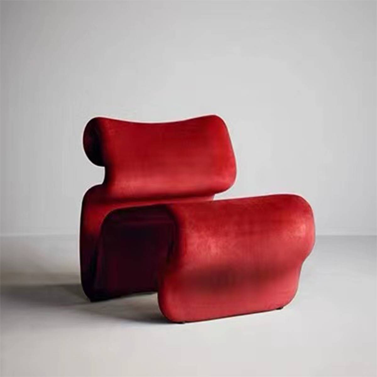 Red modern curved lounge chair