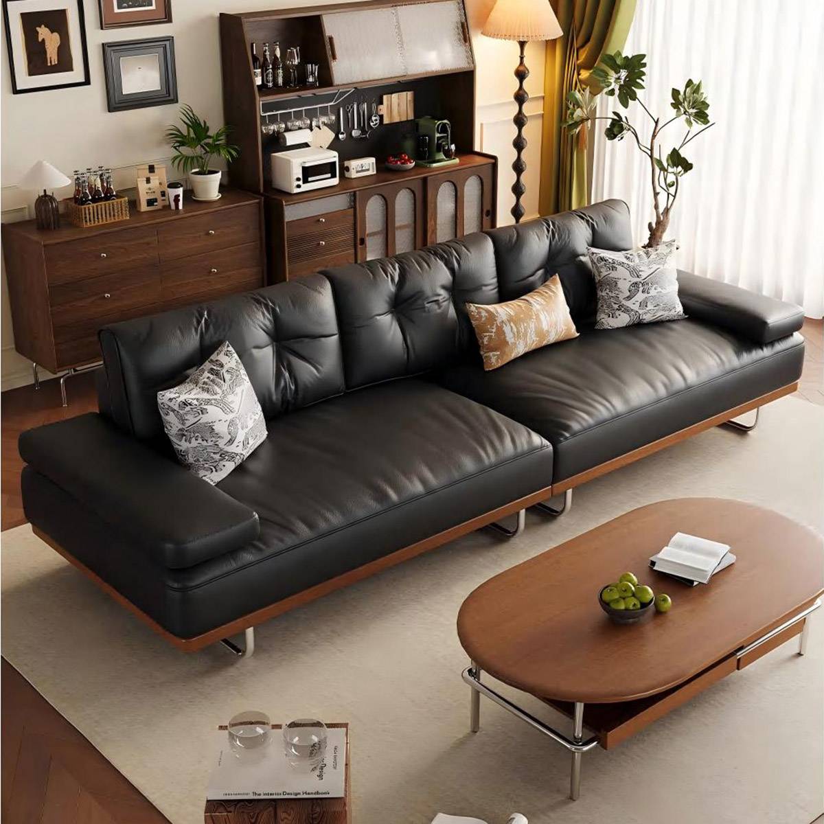 Black leather mid-century modern sofa with wooden frame and metal legs in a living room setting