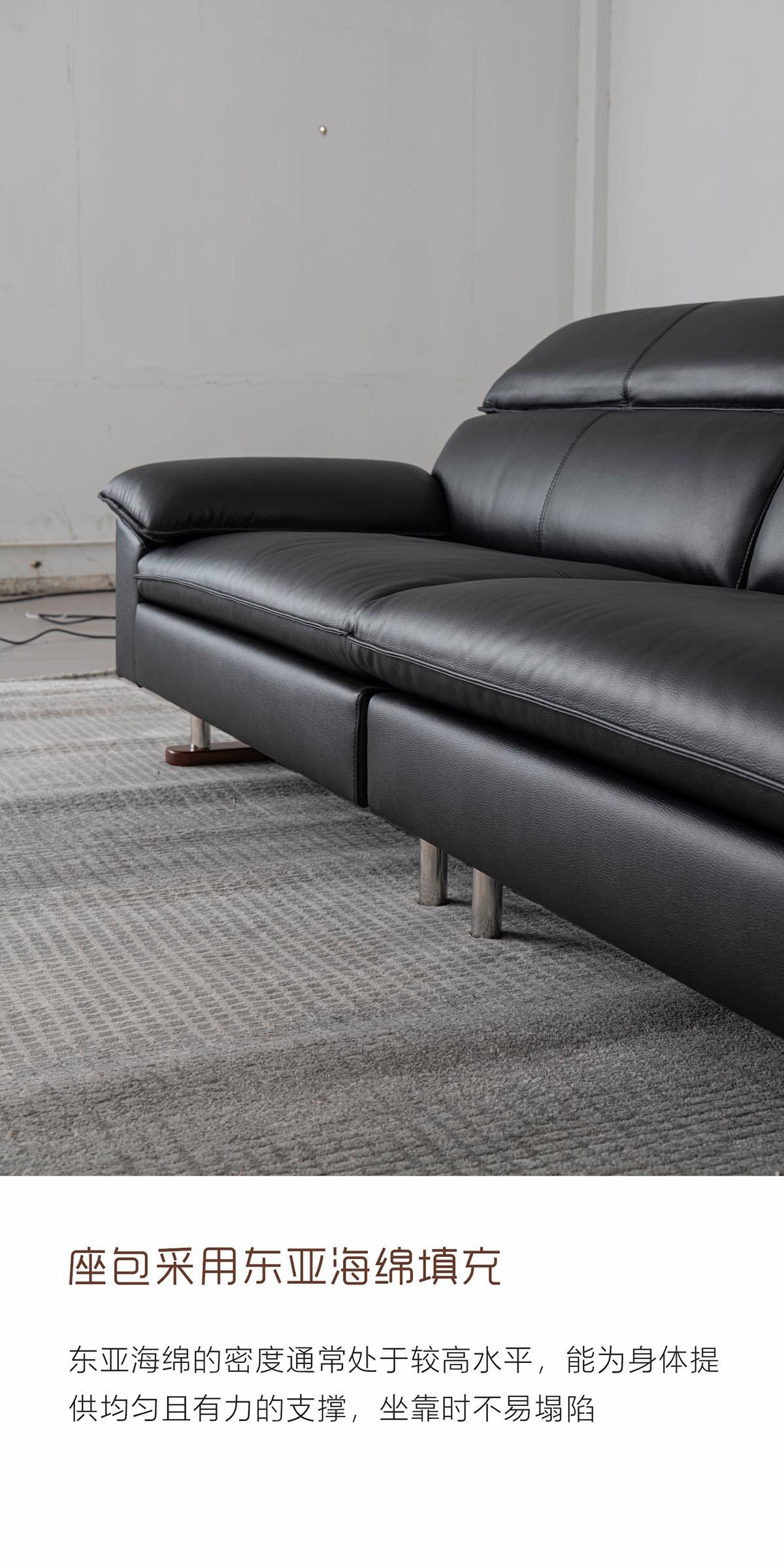 Side view of the sofa seat cushion and metal legs on a grey rug