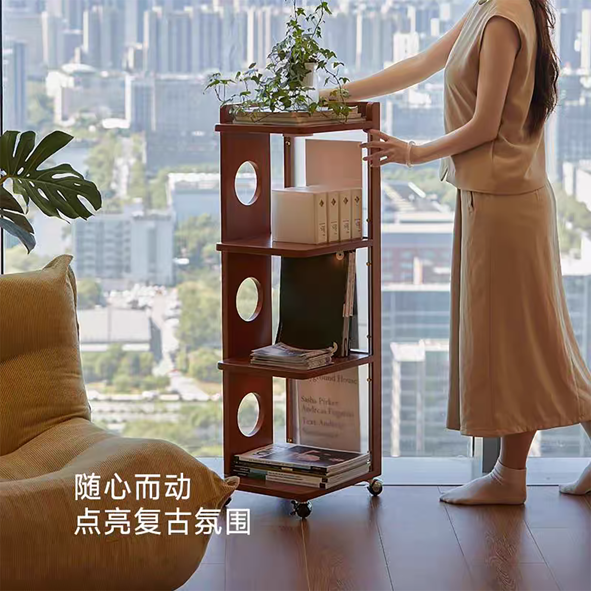 Side cabinet with plants and books near a window