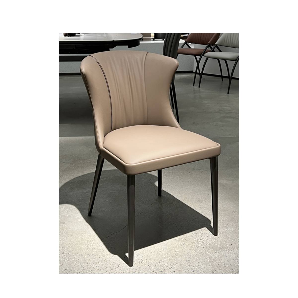 Coffee colored modern dining chair with carbon steel legs