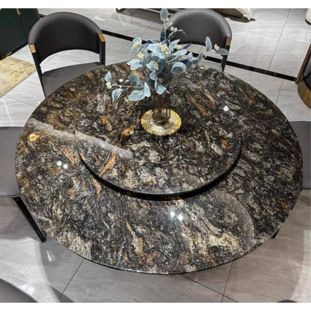 Top-down view of the dining table highlighting the Platinum Diamond marble pattern and the central rotating tray.