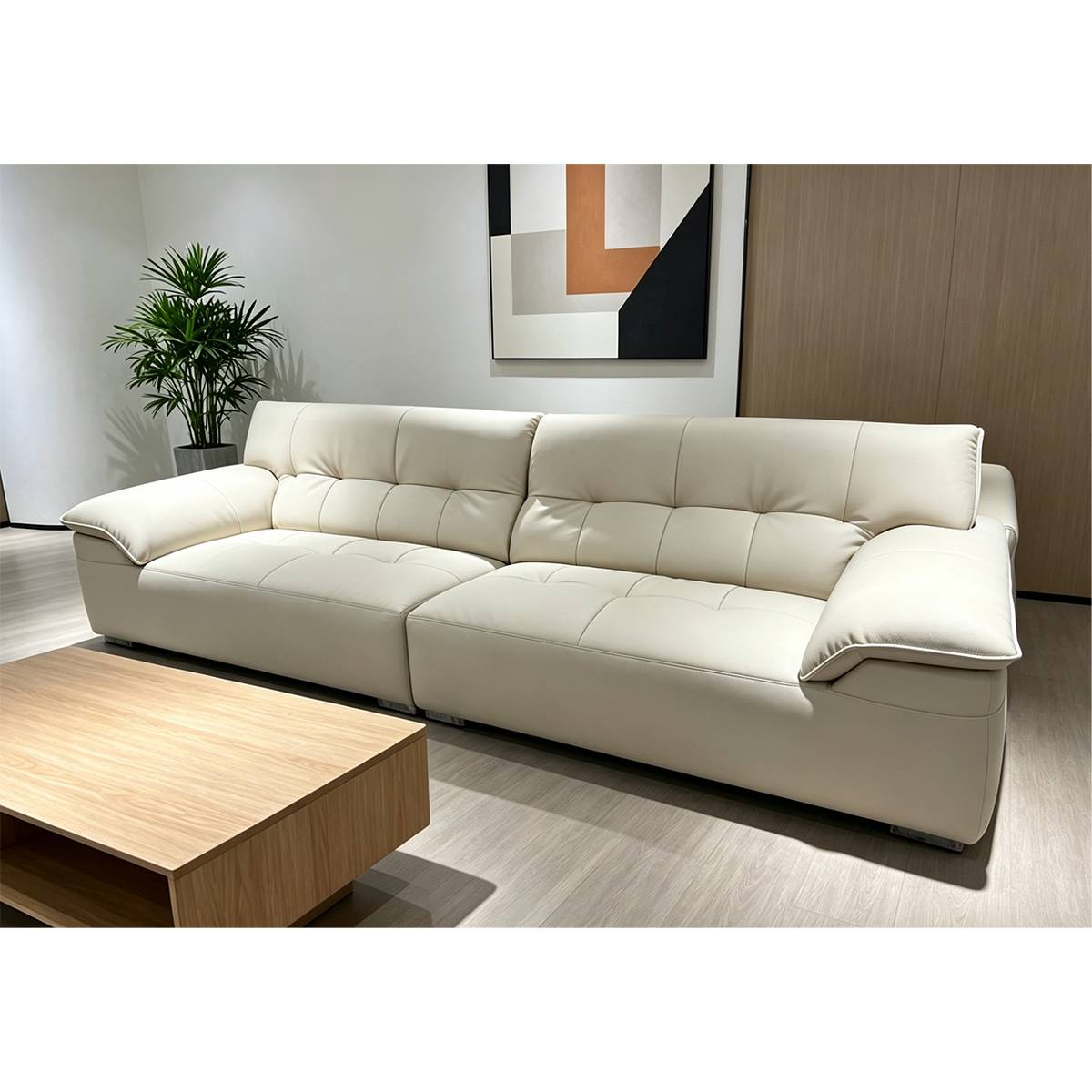 Another angle of the cream-colored straight sofa highlighting the armrests and overall shape