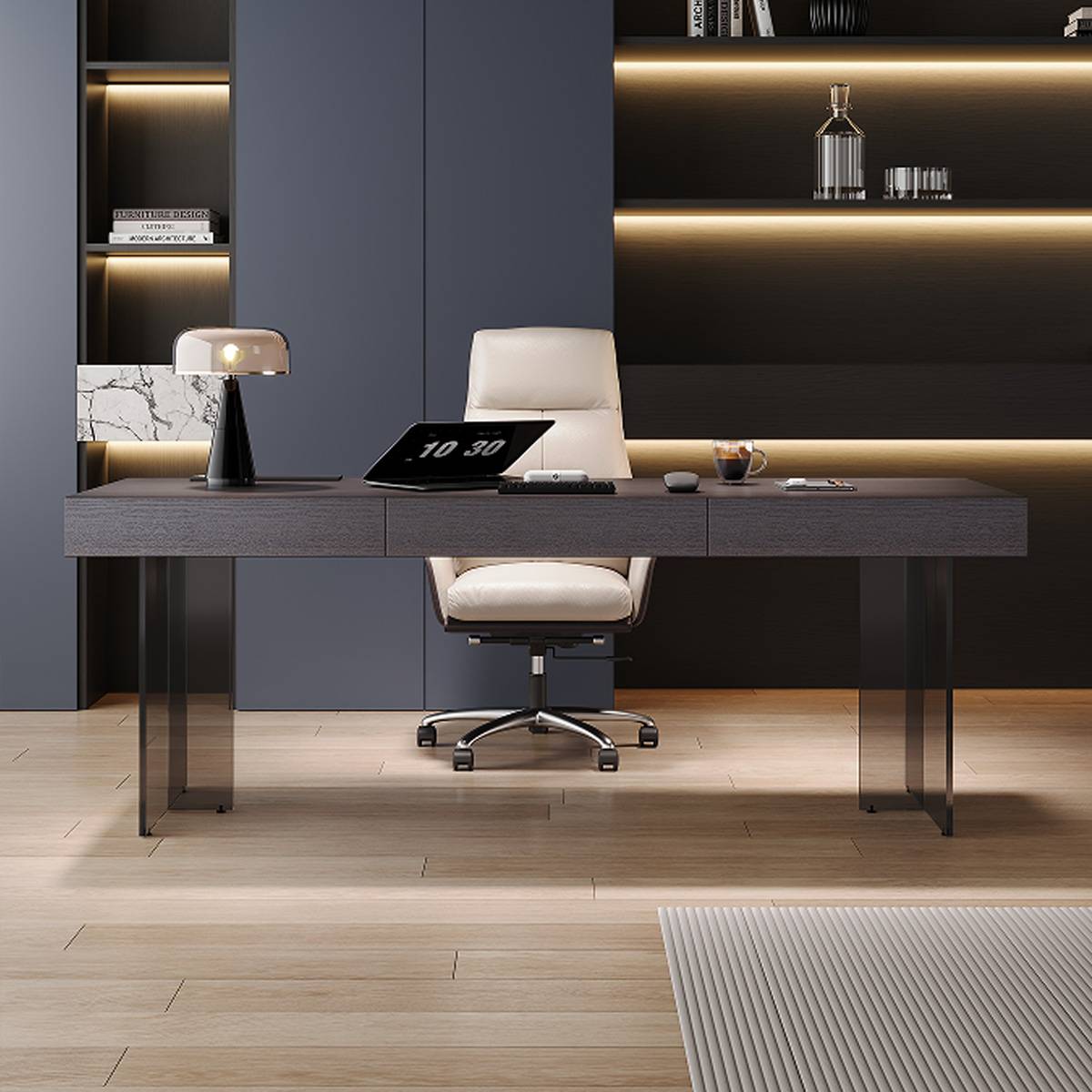 Front view of the desk showing the laptop, lamp, and office chair setup