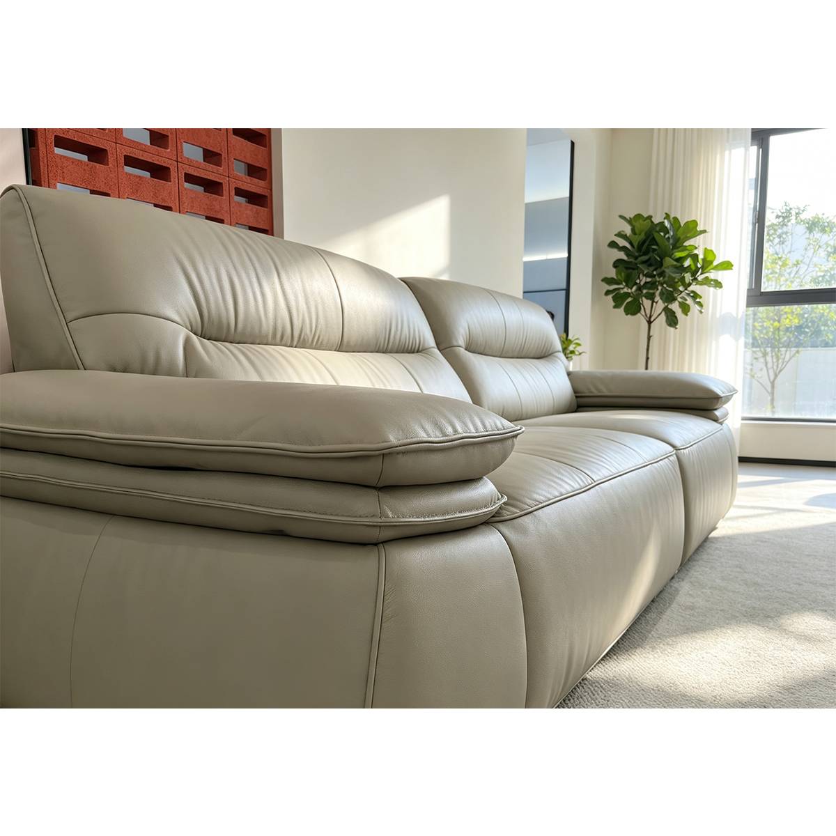 Close-up detail of the sofa's eco-leather texture and cushion stitching